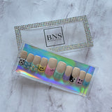 faux-ongles moyens press-on-nails réutilisables sans colle nudes swirls dessins varies